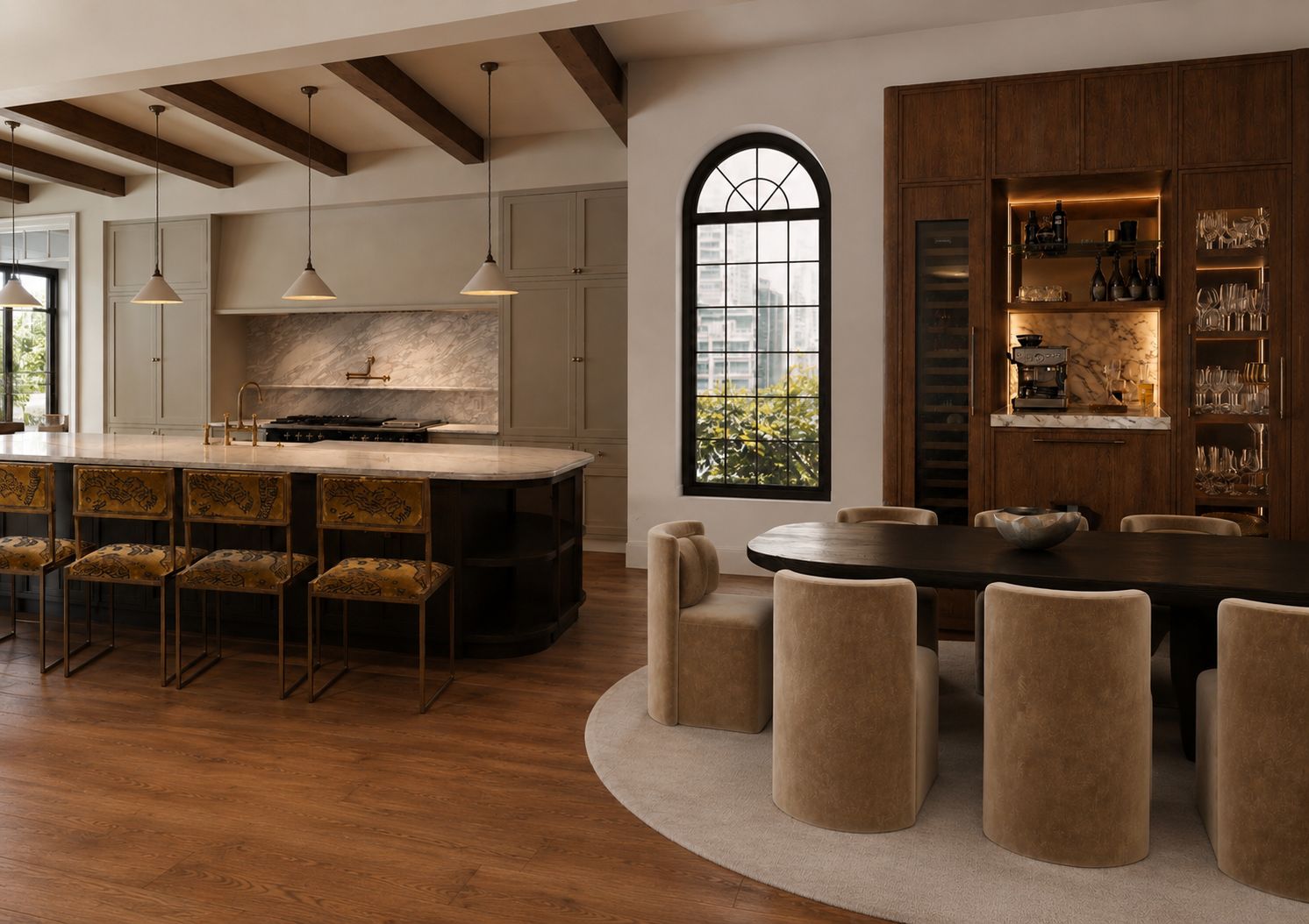 A warm, layered living room with a chocolate-brown velvet sofa, terracotta-toned artwork, an olive fringed ottoman and a green marble side table.